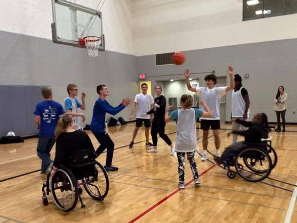 students playing basketball